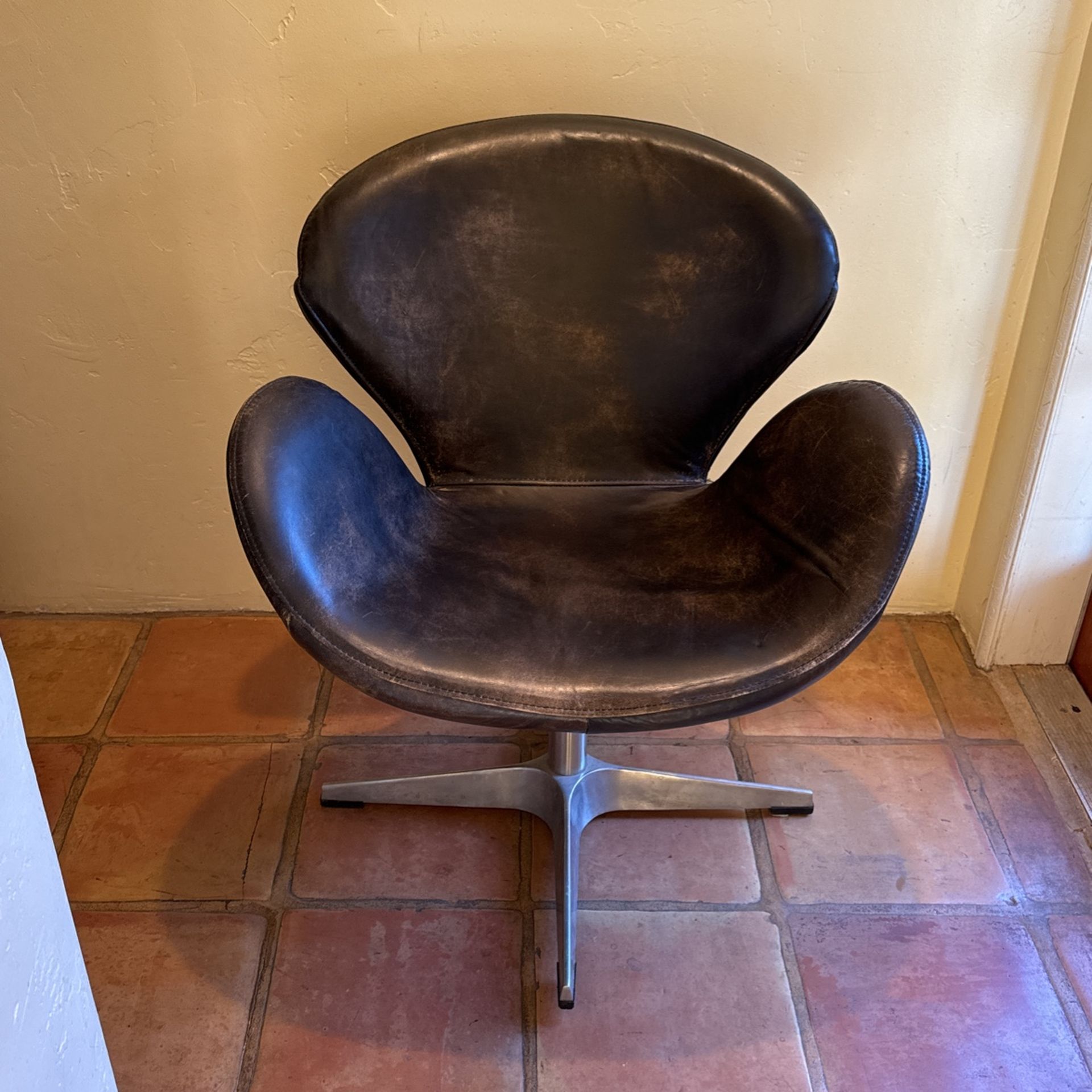 Pair of Leather Swan Chairs