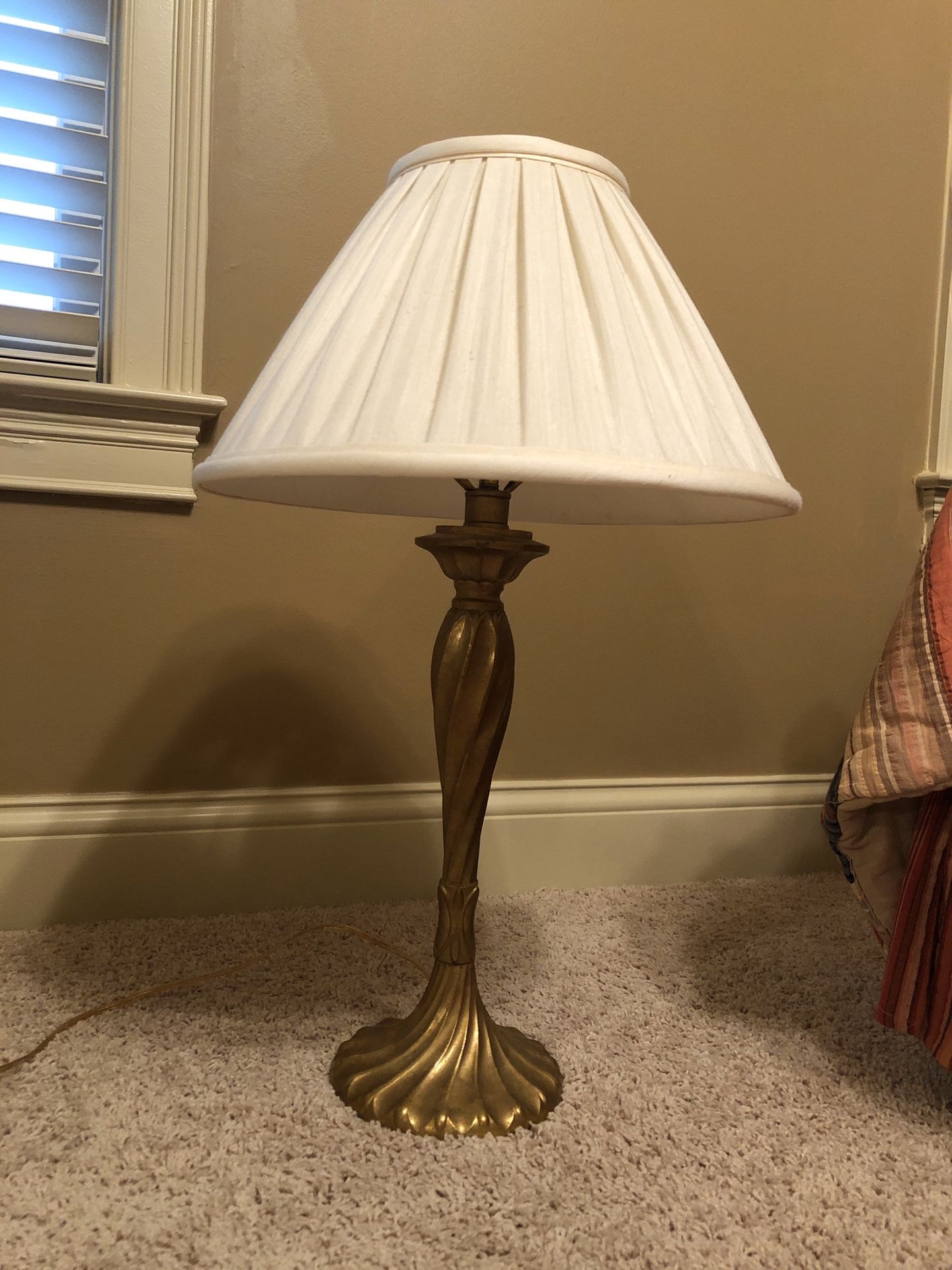 Lamp with gold base