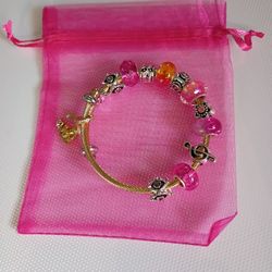 Cable Bracelet With Fusia Pink Charms 