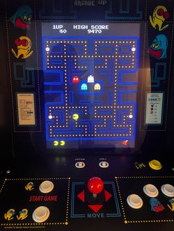 2 arcade games pac man and mortal combat