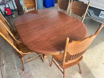Oak table and 6 chairs claw foot