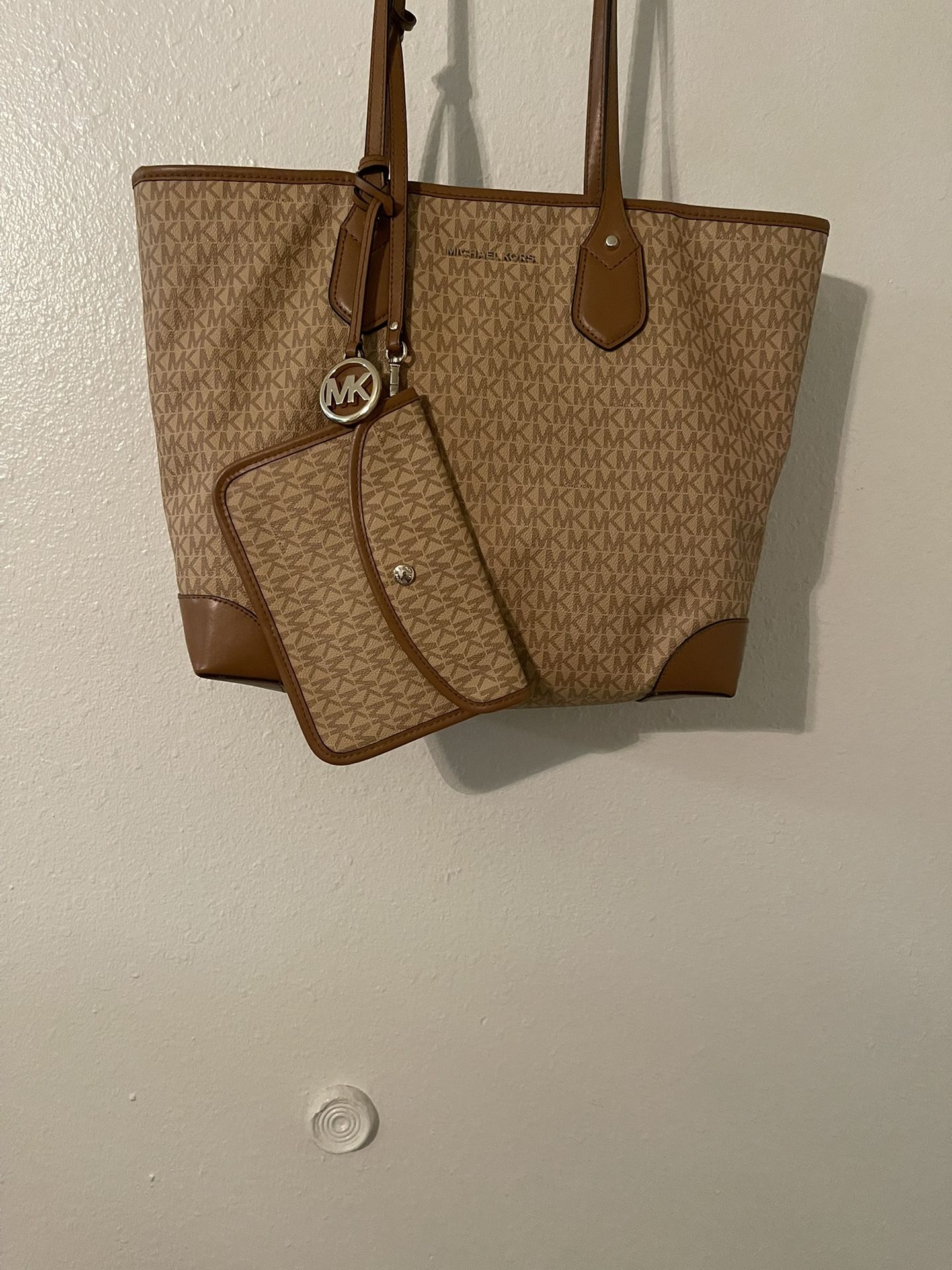 Large Open Space Mk Purse With Pouch Brown/ Tan In Color