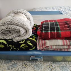 Pile Of 3 Lap Blankets And One Large Regular Size Never Taken Out Of Package