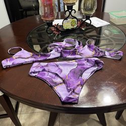 Two-piece purple and gold women's swimsuit 