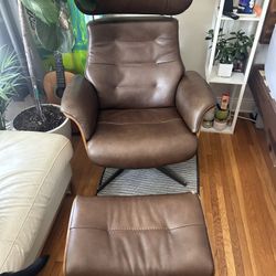 Leather swivel chair and ottoman