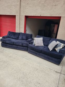 2 blue couches