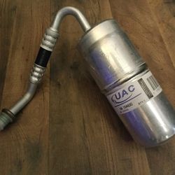 Brand New, OE replacement: UAC branded Accumulator with Hose Assembly