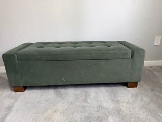 Beautiful sage green upholstered storage ottoman Great for a bedroom, living room, or at the foot of a bed. Condition: Used. Please see photos for co