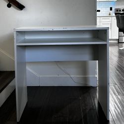 White wooden desk and chair 