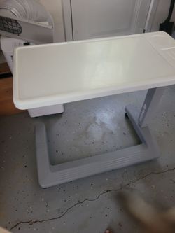 Rolling hospital bed side tray