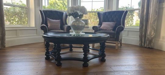 Tommy Bahama Round Dark Wood Coffee Table with Glass Top