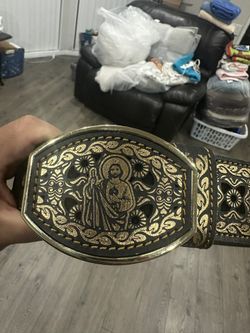 San Judas gold colored leather belt, laser cut design