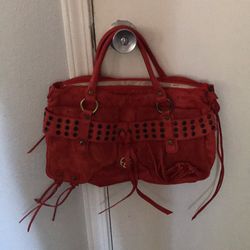 Orange purse with fringe
