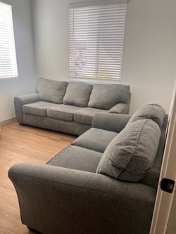Sofa and love seat couch (free delivery)