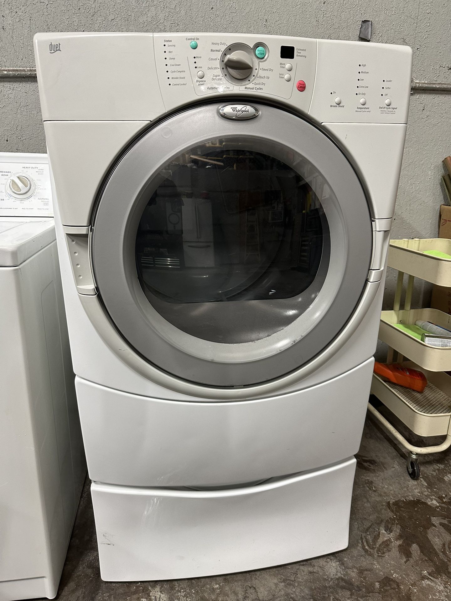Whirlpool electric dryer on pedestal can deliver
