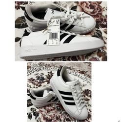Woman’s Adidas (SIZE 7 1/2)