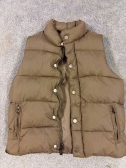 Little boys vest fits a six to eight year old child, brown in color