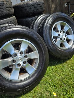 Toyota rims 6 lugs tacoma good tires 80%
