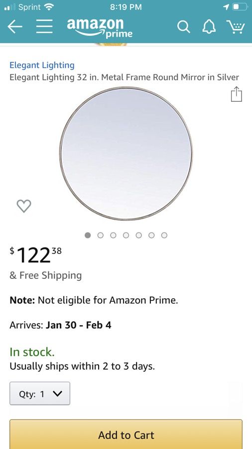 Metal framed round mirror