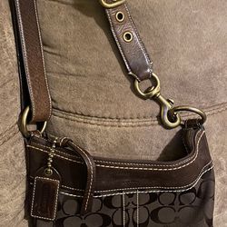 COACH Crossbody Brown purse,used but in excellent condition! Brass buckle w/ strap
