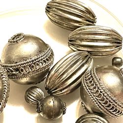 12 German Silver Beads