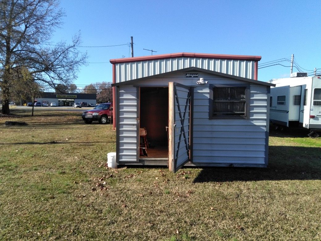 10 ft by 12 ft portable building 4 ft door insulated $1,200