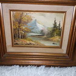 Vintage signed landscape oil painting on canvas for sale.
