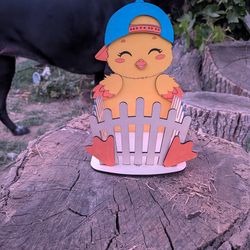 Small basket made out of wood.