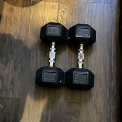 Two 30 pound dumb bells