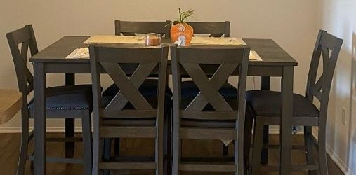 Grey dining table with 6 chairs