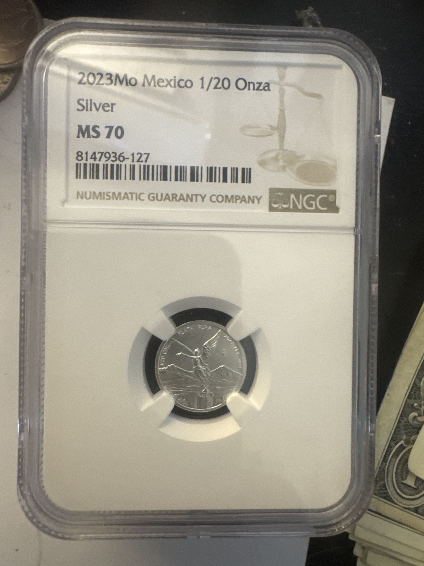 This is a 2023 1/20 Onza Silver Libertad coin graded MS 70 by NGC.