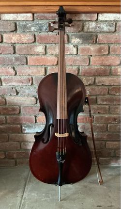 Cello Vintage K Model 55(1/2 Size )(Made in 1951)(Serial Number 26043)(Cleaned Up W/New Strings)(Original Bow and Bag)(Very Good Condition)