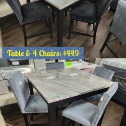 New 5 Pcs Dining Set 
Counter Height
Table Faux Marble White Top
Black Base 
Available In Light Blue Chairs Or Black Chairs 
$449 + Tax 
FREE LOCAL DE