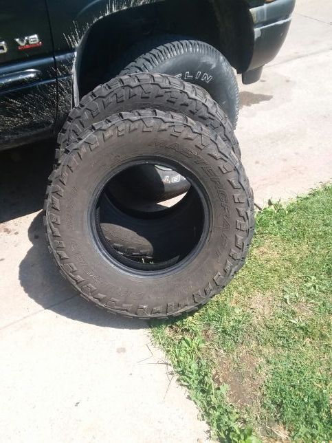 2 tires. 295-85-r16 truck tires/swampers
