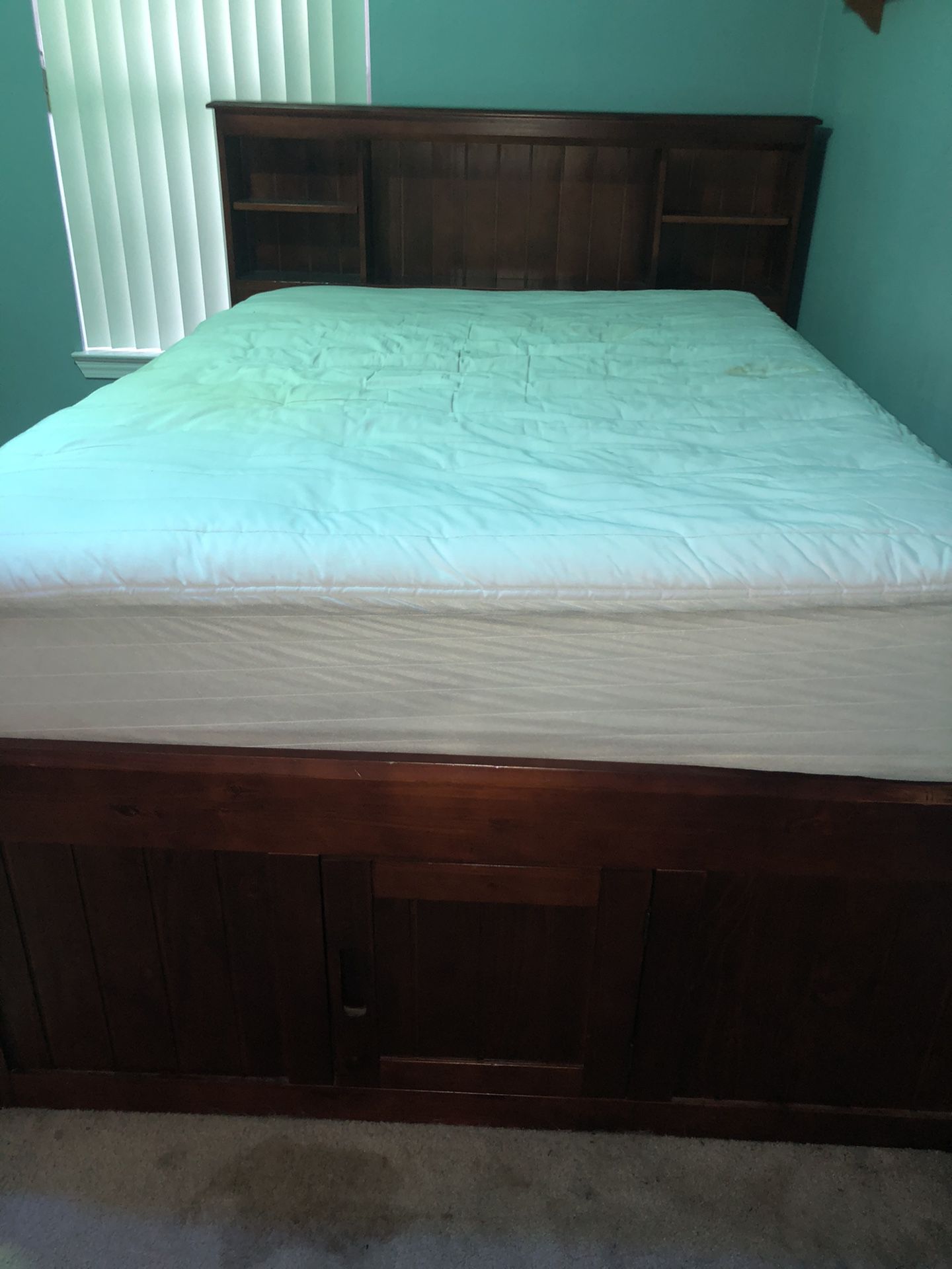 Full storage wood bed with a twin pullout bed