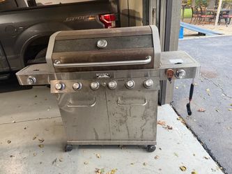 Monument 6 burner propane grill with side burners