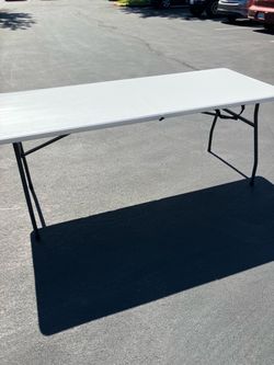 White Mainstay Folding Table W/Normal Wear & Tear(See & Click On Pictures). Still In Good Condition And Useable