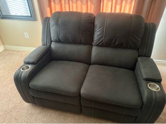 Black Faux Leather Power Reclining Loveseat with Cup Holders