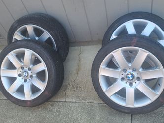 17" aluminum stock BMW rims and tires