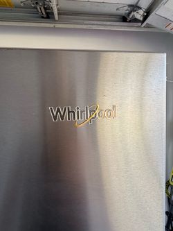 Whirlpool Stainless Steel Refrigerator (used)