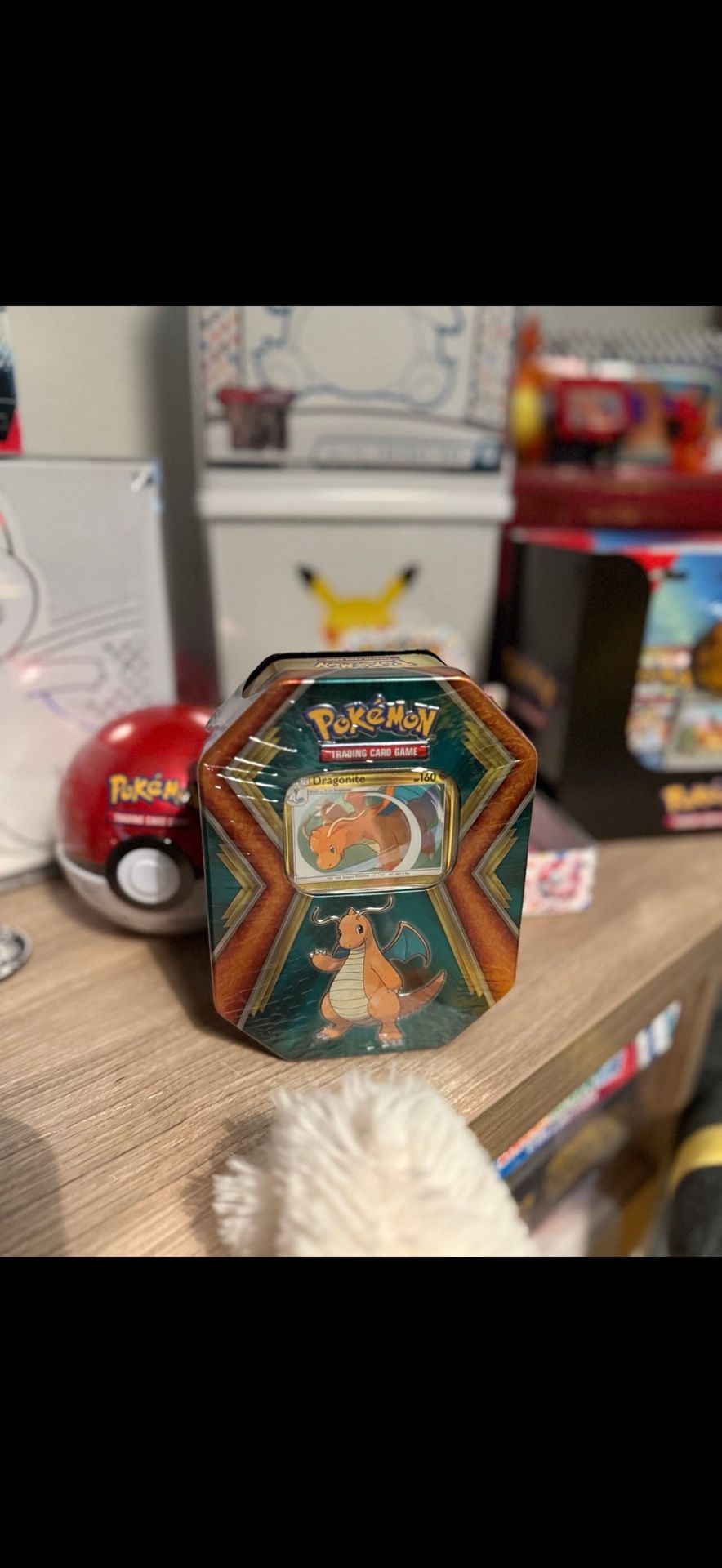 Dragonite And Charizard Tins