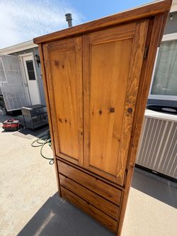 Wood clothes armoire with 3 drawers