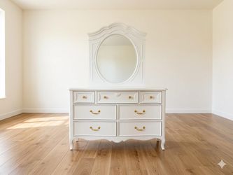 White dresser with golden handles  in good condition
