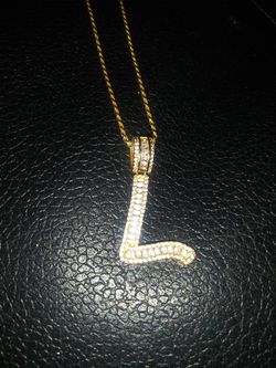 Iced out L pendant with 18 inch chain