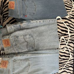 LEVI JEANS SIZE 8 & 31