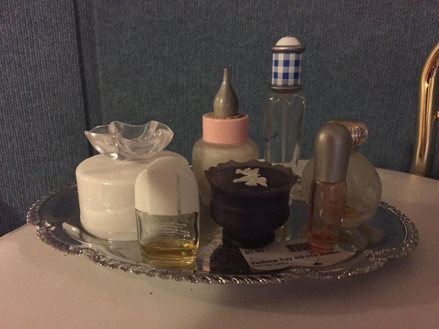 Vintage miniature perfume bottles and tray