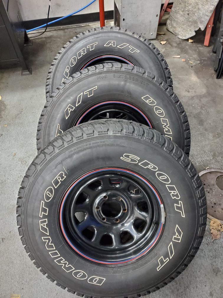 Set of 4 studded snow tires 31/{link removed}