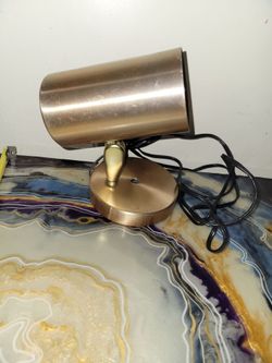 vintage Majestic copper color cylinder task lamp. It features a distinctive mid-century modern swivel cone/cylindrical shade