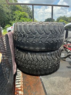 2 26" AMP Terrain Attack M/T (Mud Terrain) heavy-duty light truck tire