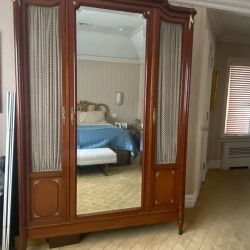 Antique Armoire With Metal Accents